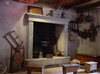 Museo etnografico Alta Valle Brembana a Valtorta, sede museale nella Casa del Pretore di Venezia: sala del camino con oggetti domestici