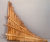  Go to the page that contains this image: "Firlinfeu" o flauto di Pan: strumento a fiato in canna di bamb
